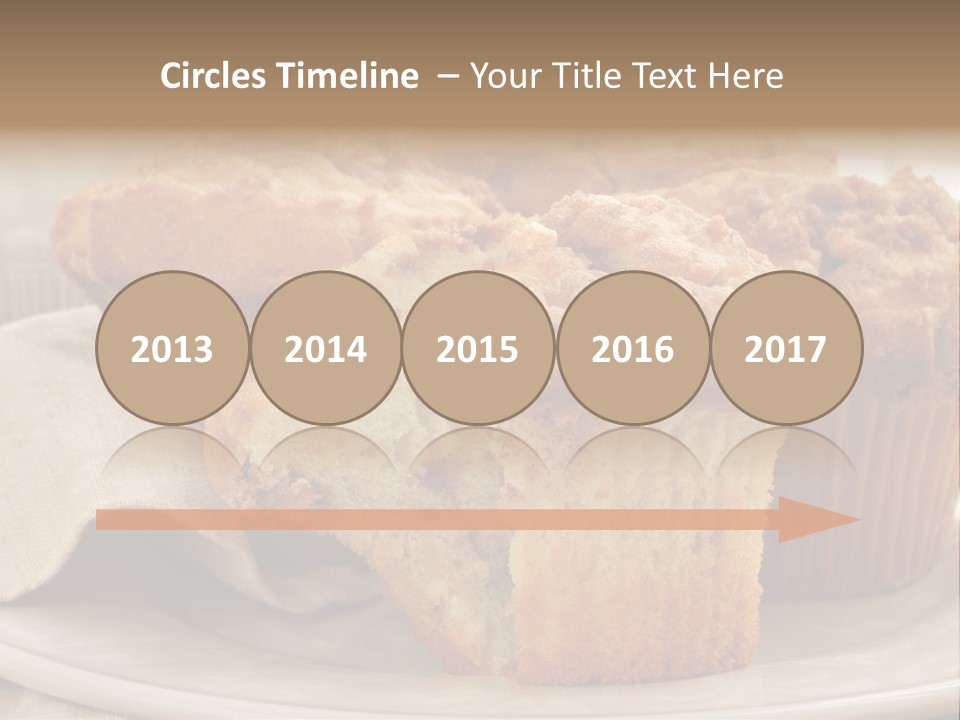 A White Plate Topped With Muffins On Top Of A Table PowerPoint Template