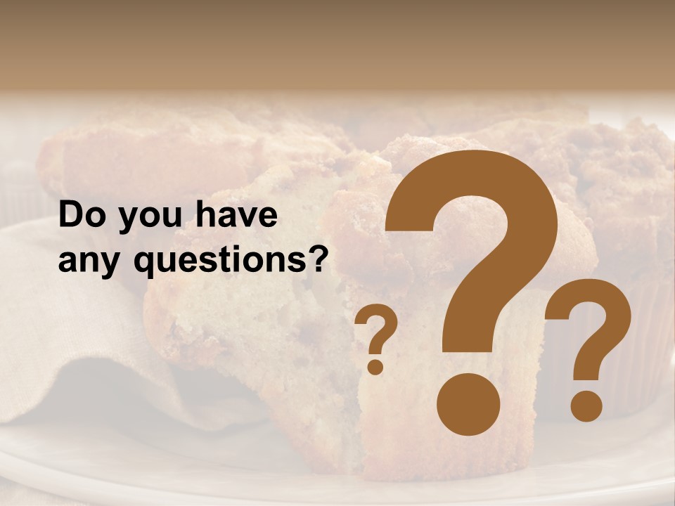 A White Plate Topped With Muffins On Top Of A Table PowerPoint Template