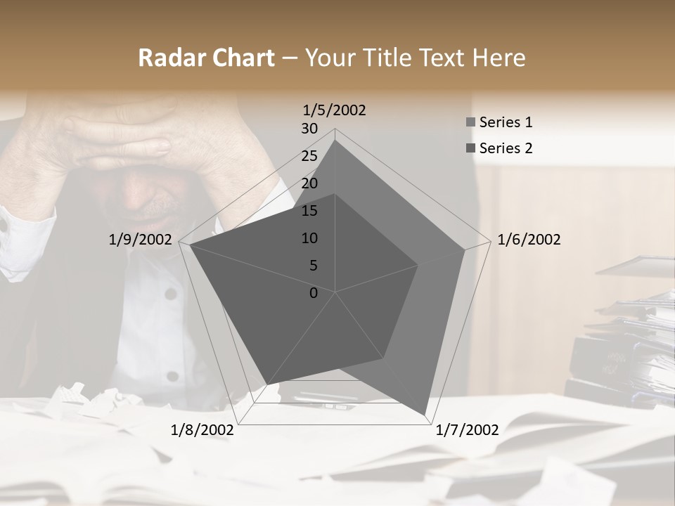 A Man Sitting At A Desk With A Pile Of Papers In Front Of Him PowerPoint Template