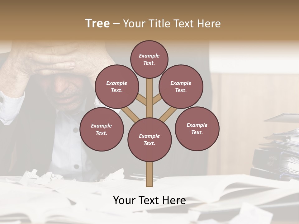 A Man Sitting At A Desk With A Pile Of Papers In Front Of Him PowerPoint Template