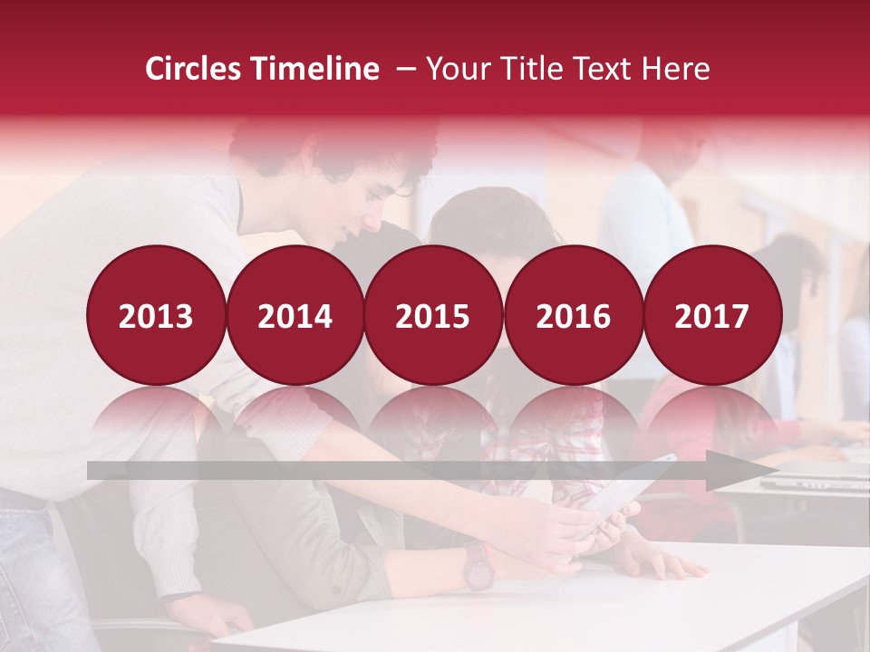 A Group Of Young People Looking At A Computer Screen PowerPoint Template