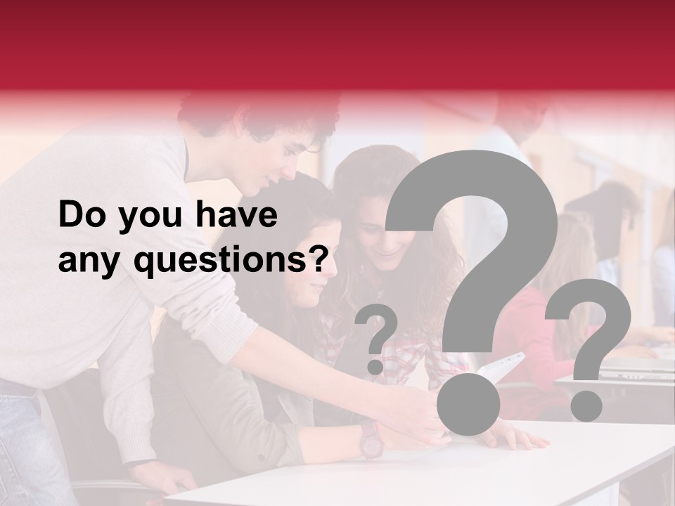 A Group Of Young People Looking At A Computer Screen PowerPoint Template