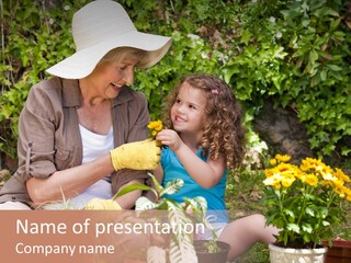 A Woman And A Little Girl Sitting In A Garden PowerPoint Template
