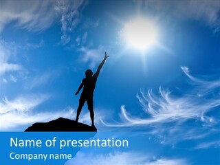 A Person Standing On Top Of A Hill With Their Arms In The Air PowerPoint Template