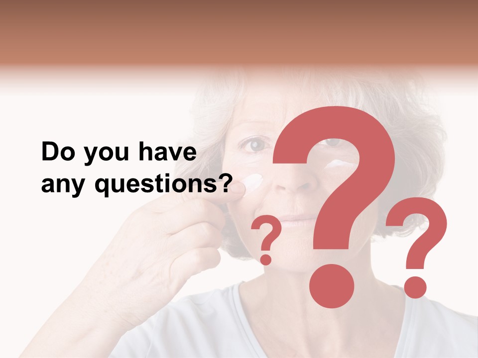 An Older Woman Holding A Cream On Her Face PowerPoint Template