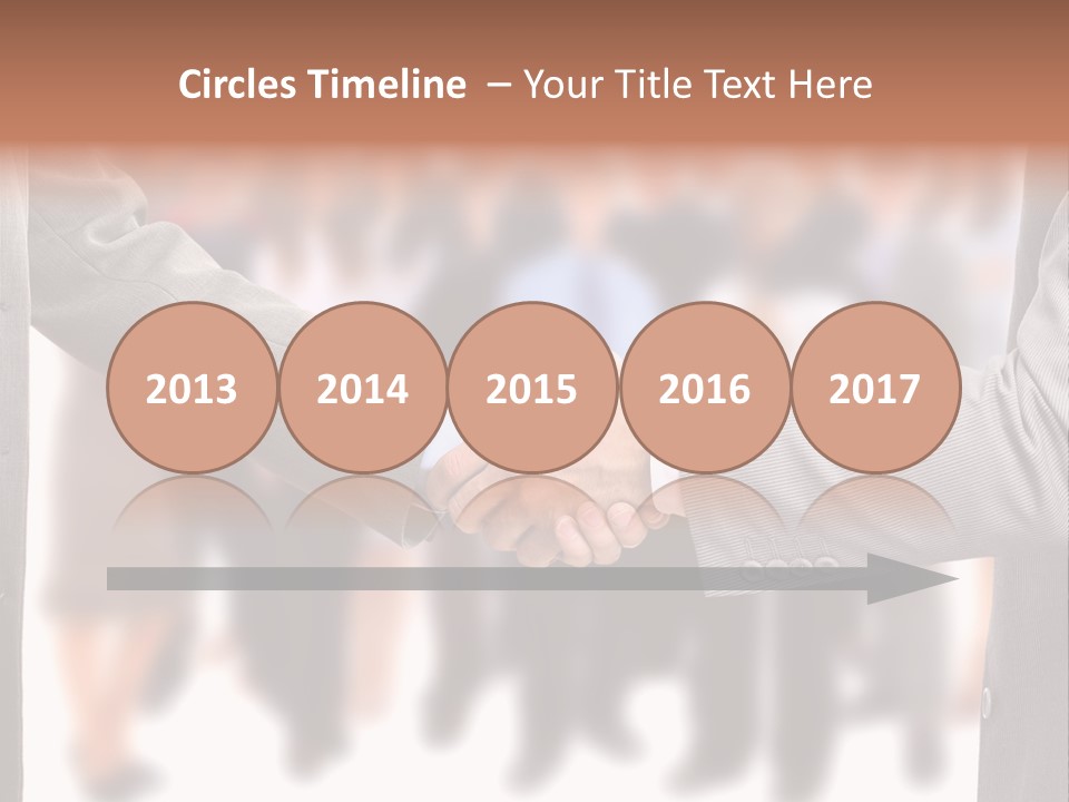 Two Men Shaking Hands In Front Of A Group Of People PowerPoint Template