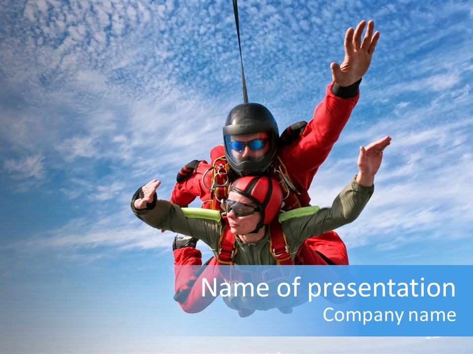 A Man In A Red Jacket Is Paragliding In The Sky PowerPoint Template