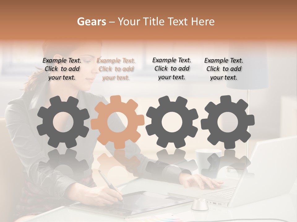 A Woman Sitting At A Desk Using A Laptop Computer PowerPoint Template