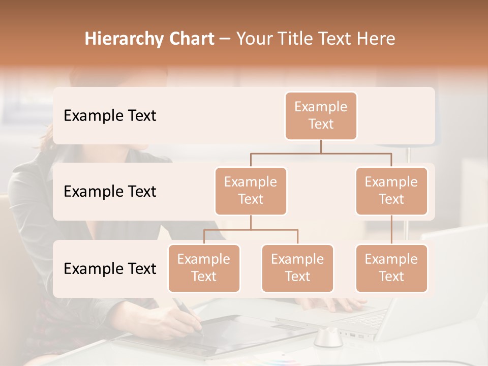 A Woman Sitting At A Desk Using A Laptop Computer PowerPoint Template