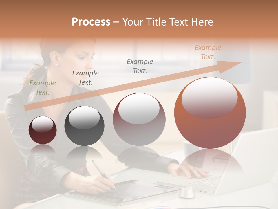 A Woman Sitting At A Desk Using A Laptop Computer PowerPoint Template