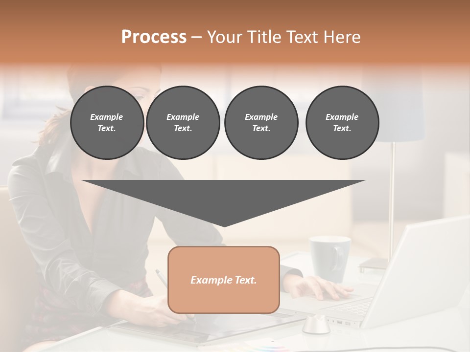 A Woman Sitting At A Desk Using A Laptop Computer PowerPoint Template