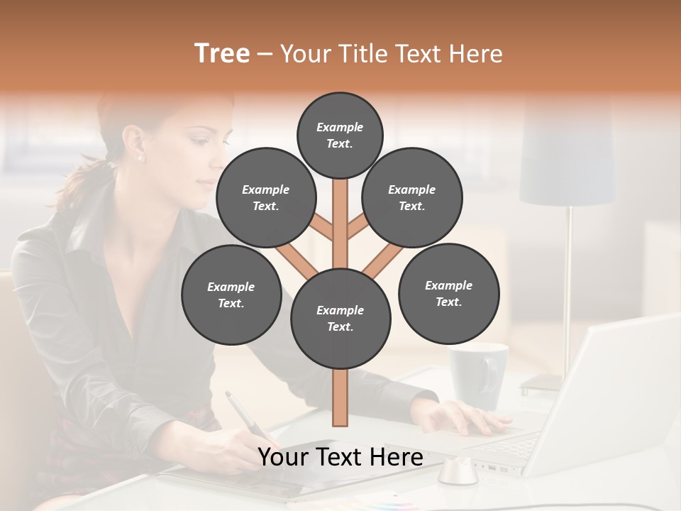 A Woman Sitting At A Desk Using A Laptop Computer PowerPoint Template