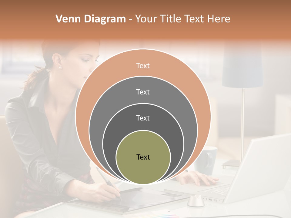 A Woman Sitting At A Desk Using A Laptop Computer PowerPoint Template