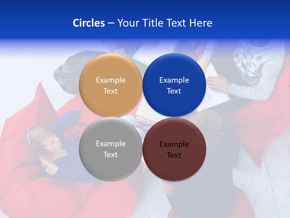 A Group Of People Sitting On Bean Bag Chairs Working On Laptops PowerPoint Template