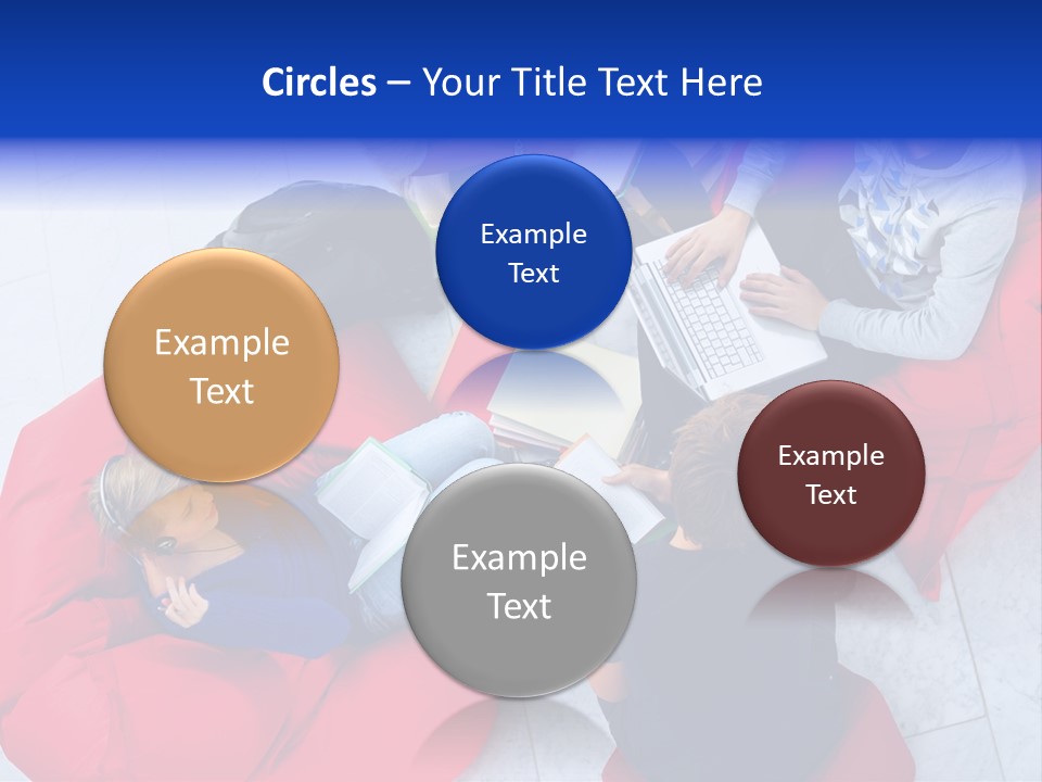 A Group Of People Sitting On Bean Bag Chairs Working On Laptops PowerPoint Template