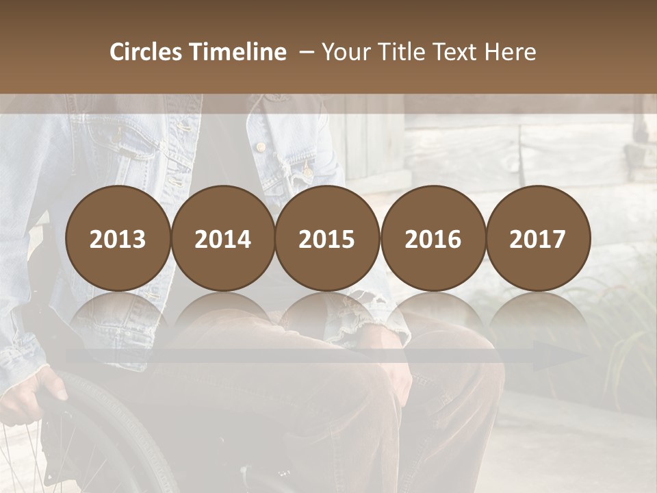 A Man In A Wheelchair Is Smiling For The Camera PowerPoint Template