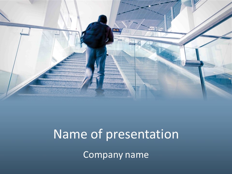 A Man Walking Down A Flight Of Stairs In A Building PowerPoint Template