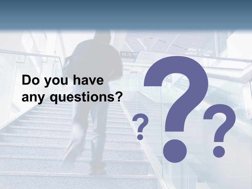 A Man Walking Down A Flight Of Stairs In A Building PowerPoint Template