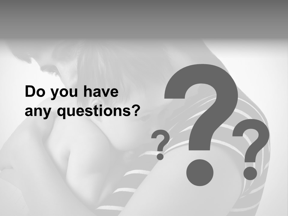 A Woman Holding A Baby In Her Arms PowerPoint Template