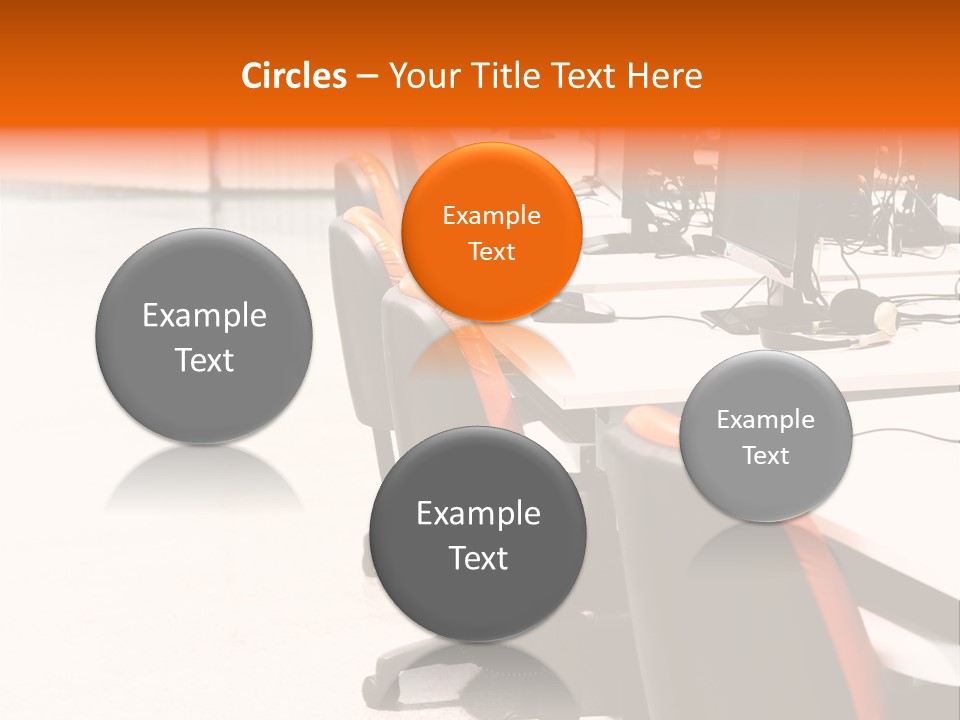 A Row Of Computer Monitors Sitting On Top Of A Table PowerPoint Template