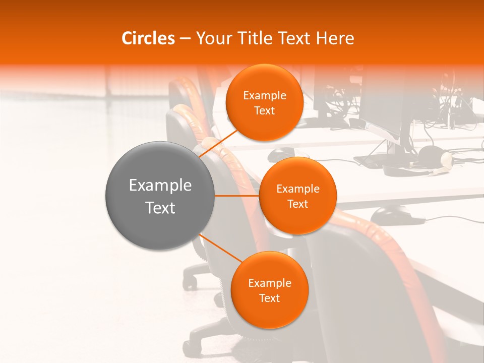 A Row Of Computer Monitors Sitting On Top Of A Table PowerPoint Template