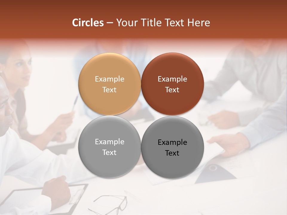 A Group Of People Sitting Around A Table PowerPoint Template