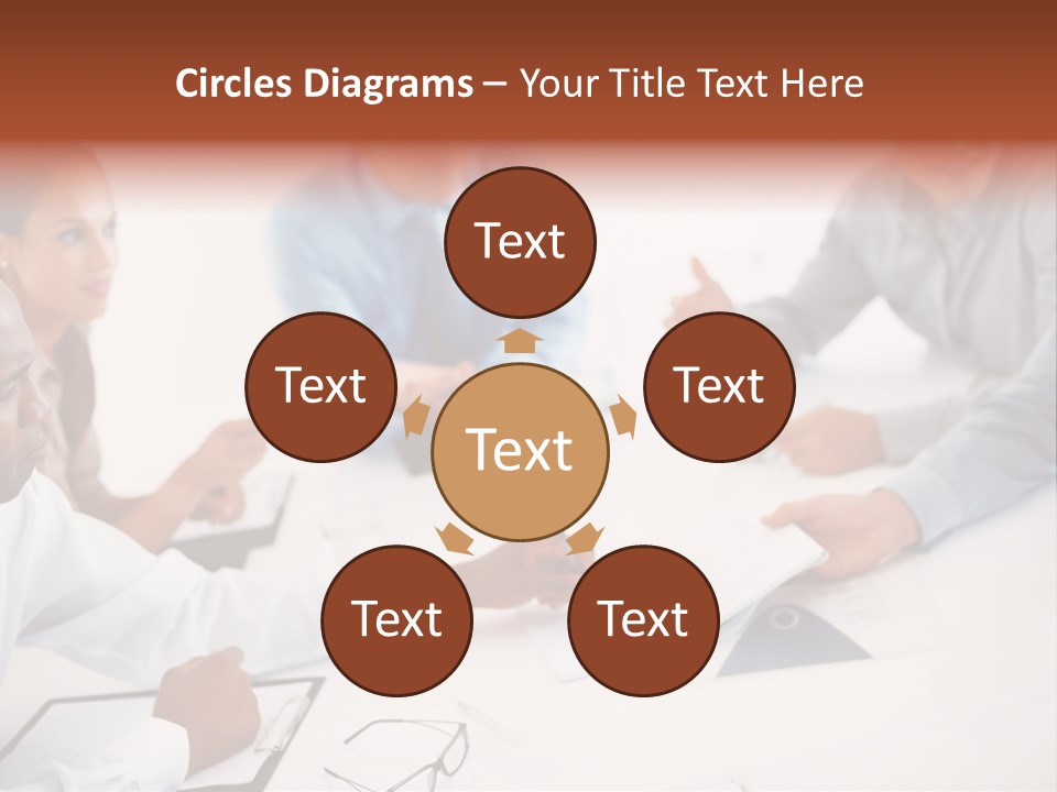 A Group Of People Sitting Around A Table PowerPoint Template