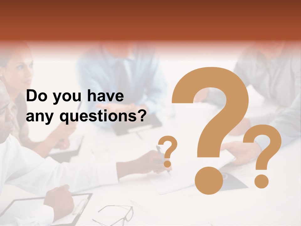 A Group Of People Sitting Around A Table PowerPoint Template