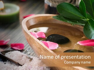 A Wooden Bowl Filled With Stones And Flowers PowerPoint Template