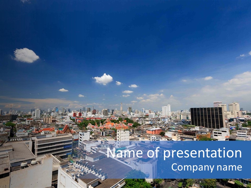 A City Skyline With A Blue Sky And Clouds PowerPoint Template
