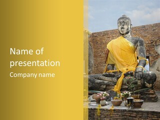 A Buddha Statue Sitting On Top Of A Brick Wall PowerPoint Template