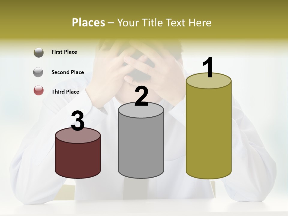 A Man Sitting At A Desk With His Hands On His Head PowerPoint Template