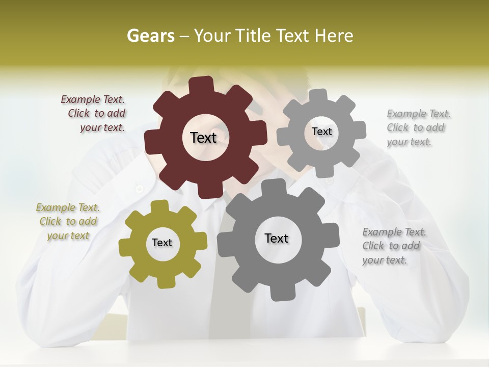 A Man Sitting At A Desk With His Hands On His Head PowerPoint Template