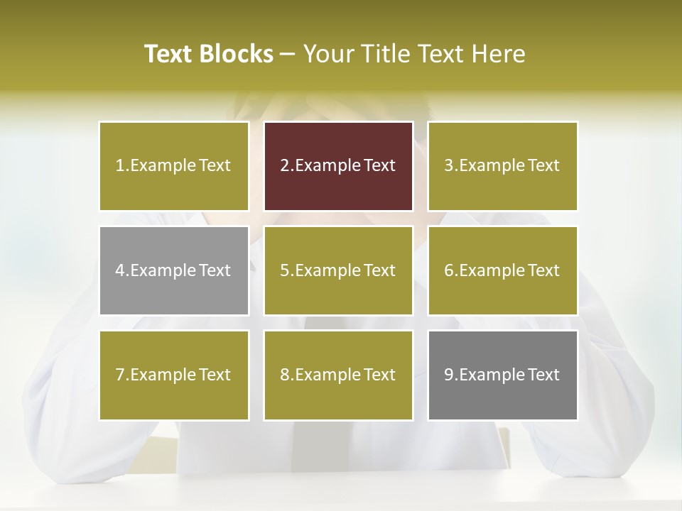 A Man Sitting At A Desk With His Hands On His Head PowerPoint Template