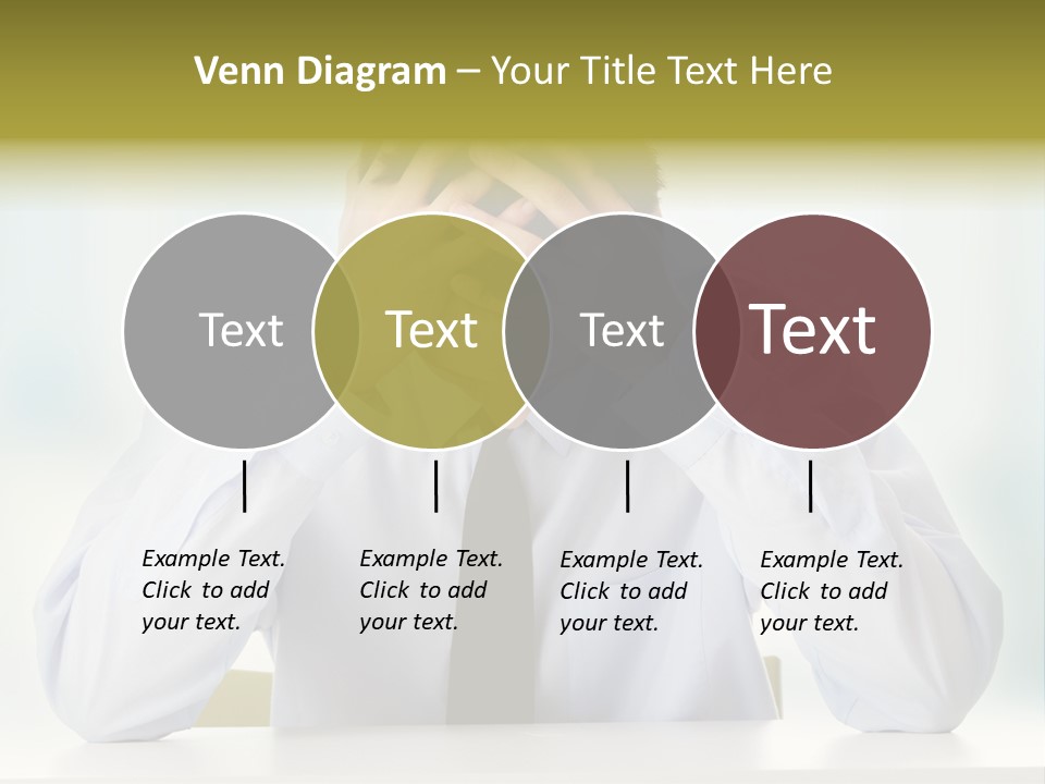 A Man Sitting At A Desk With His Hands On His Head PowerPoint Template