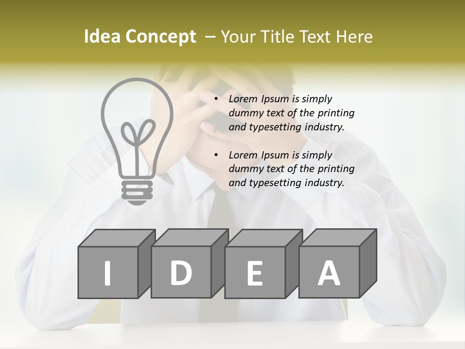 A Man Sitting At A Desk With His Hands On His Head PowerPoint Template
