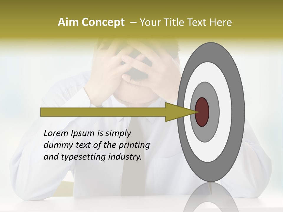 A Man Sitting At A Desk With His Hands On His Head PowerPoint Template