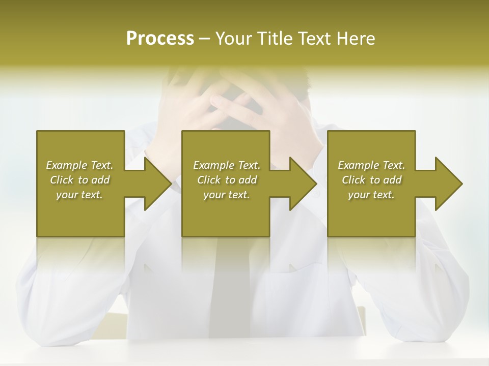 A Man Sitting At A Desk With His Hands On His Head PowerPoint Template
