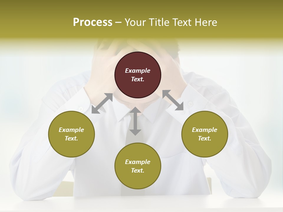 A Man Sitting At A Desk With His Hands On His Head PowerPoint Template