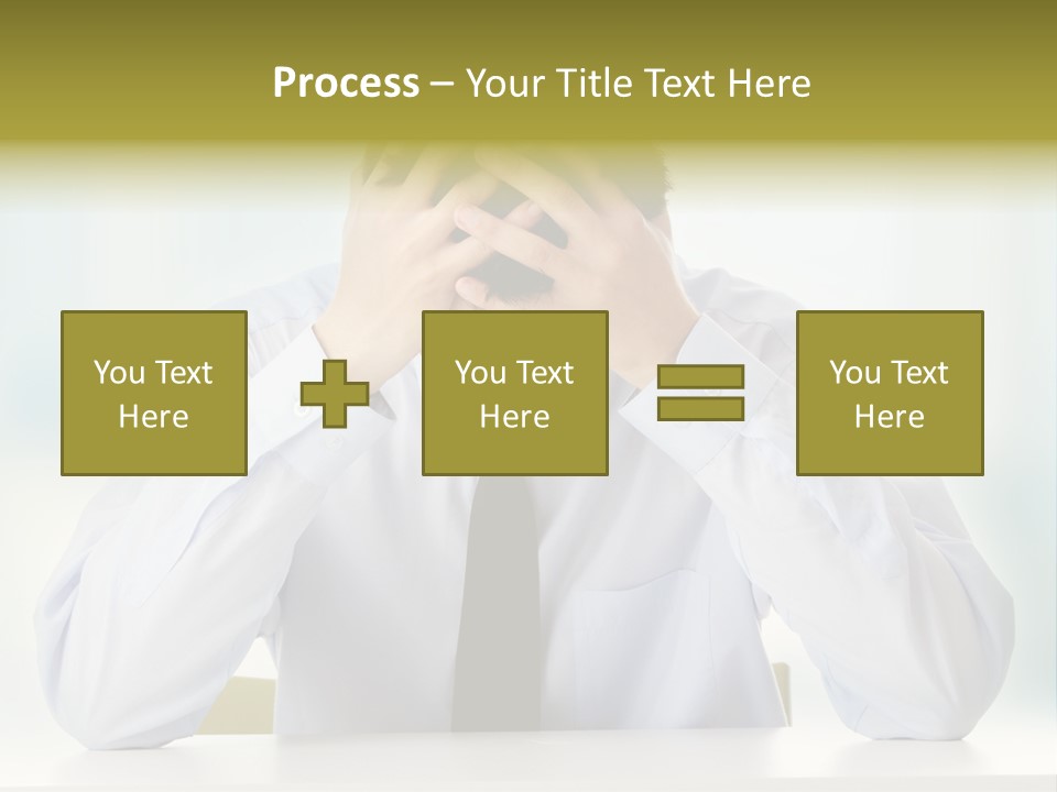 A Man Sitting At A Desk With His Hands On His Head PowerPoint Template