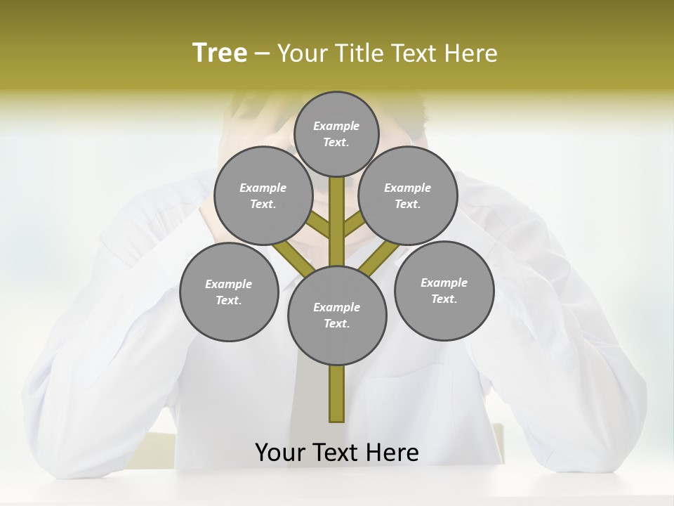 A Man Sitting At A Desk With His Hands On His Head PowerPoint Template