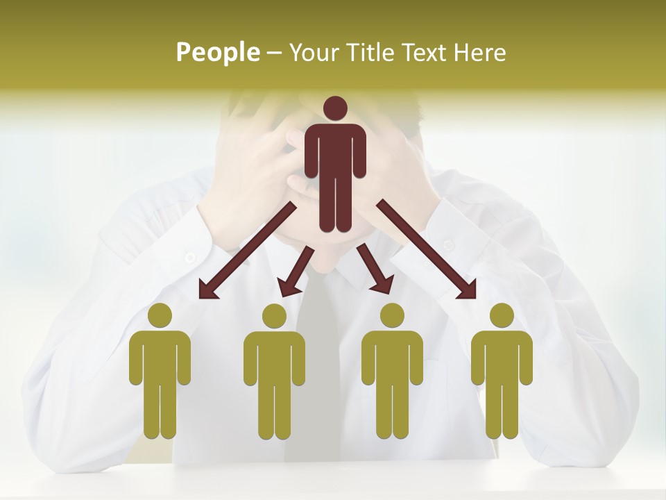 A Man Sitting At A Desk With His Hands On His Head PowerPoint Template