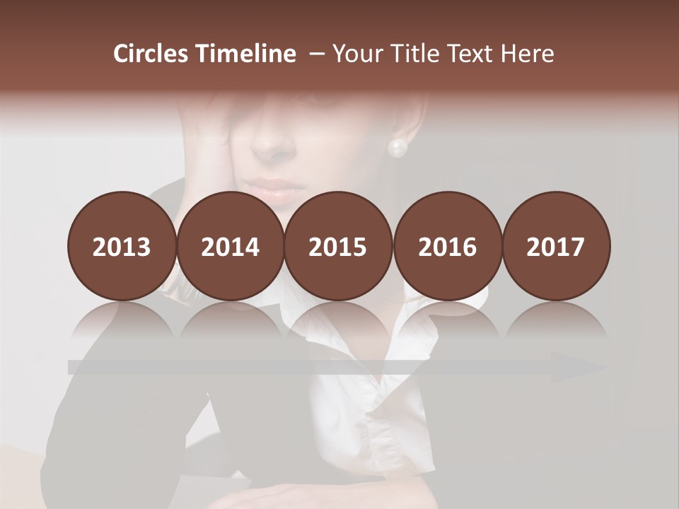 A Woman Sitting At A Desk With Her Hand On Her Head PowerPoint Template