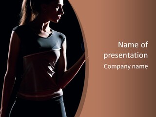 A Woman Holding A Tennis Racquet In Her Hand PowerPoint Template