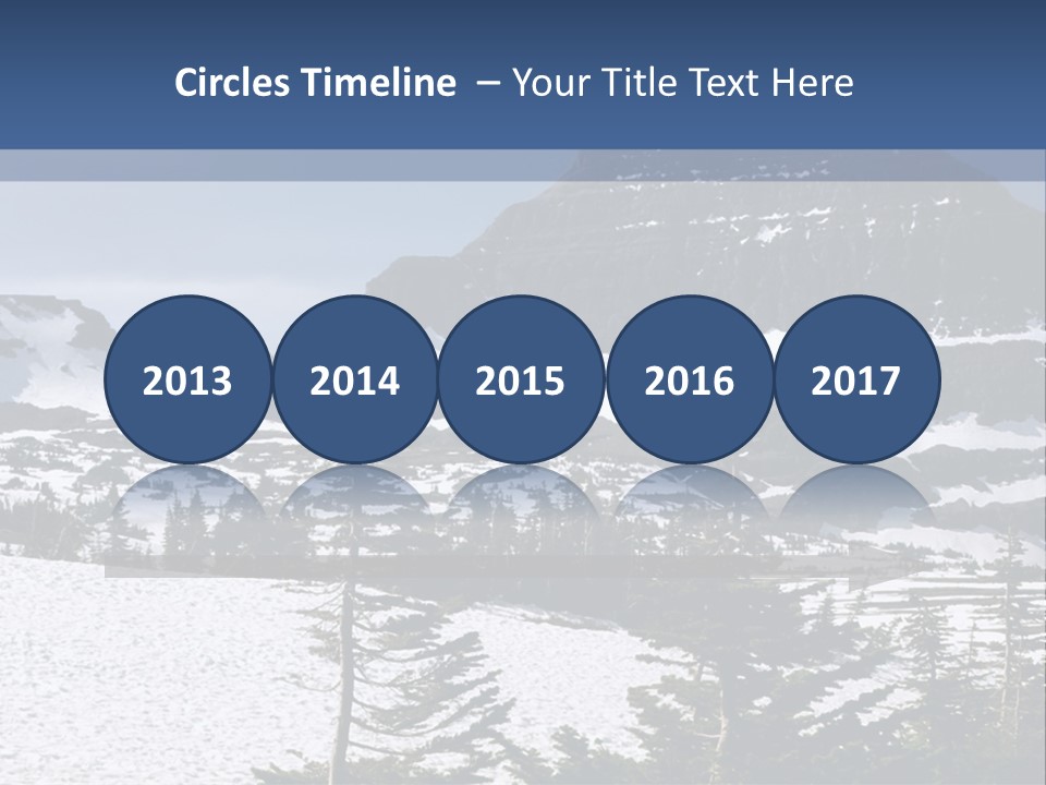 A Snow Covered Mountain With Trees In The Foreground PowerPoint Template