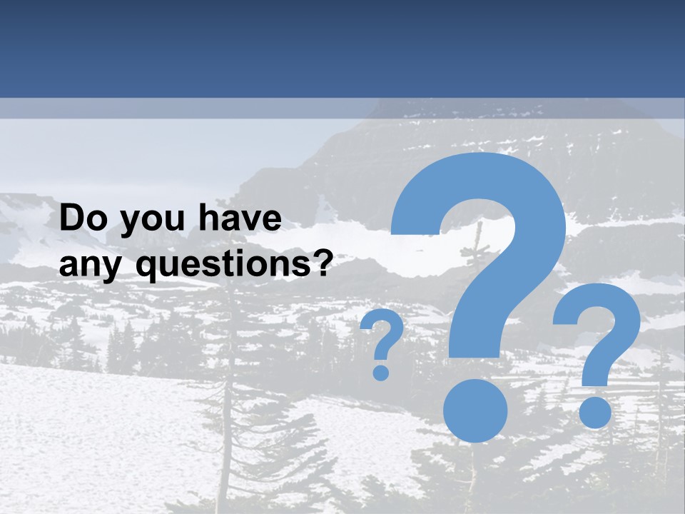 A Snow Covered Mountain With Trees In The Foreground PowerPoint Template