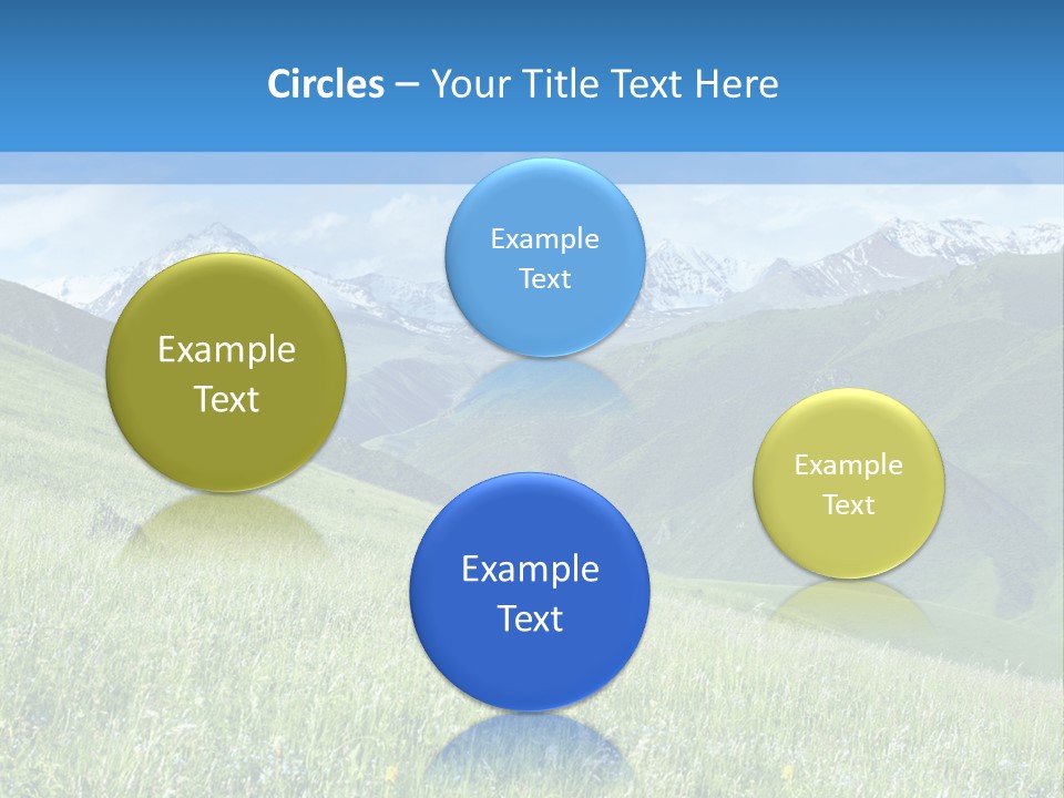 A Green Field With Mountains In The Background PowerPoint Template