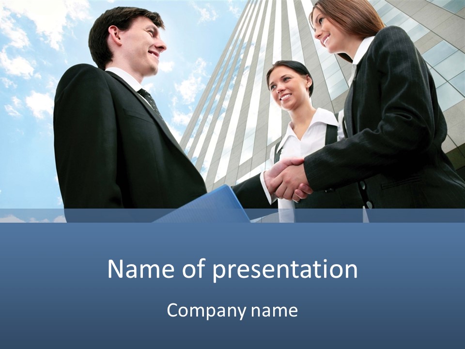 A Group Of People Shaking Hands In Front Of A Tall Building PowerPoint Template