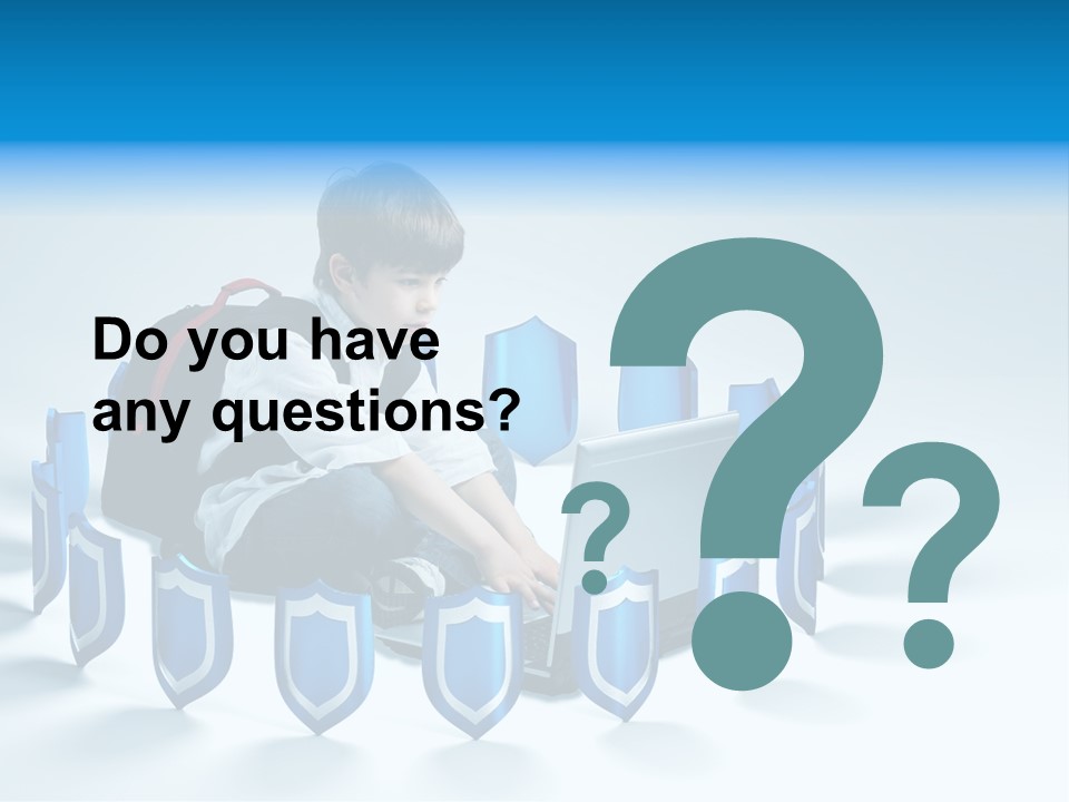 A Young Boy Sitting On The Ground Using A Laptop PowerPoint Template