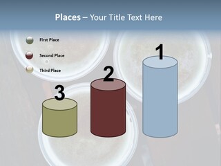 Three Cups Of Coffee Sitting On Top Of A Wooden Table PowerPoint Template